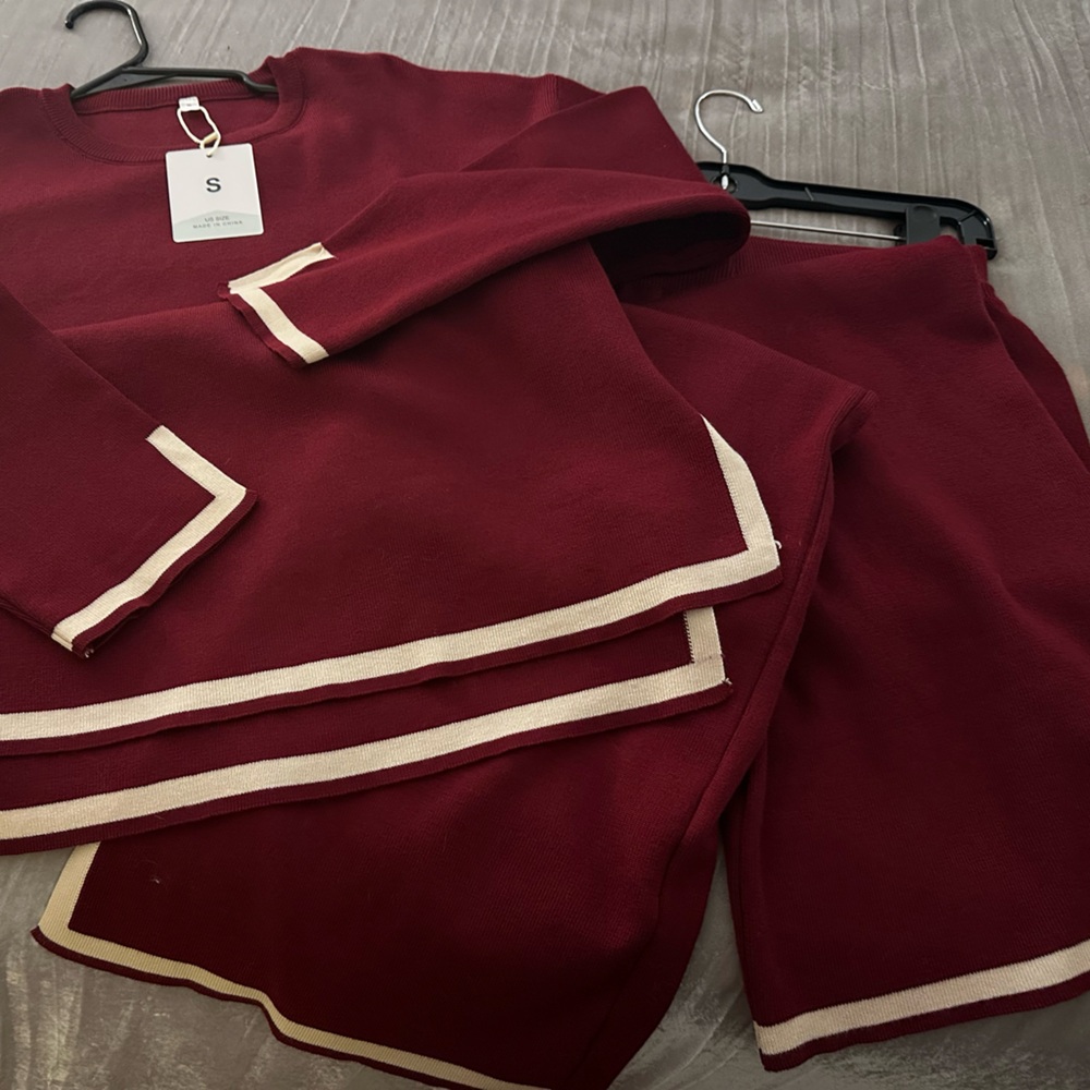 Burgundy pant and sweater suit with cream trim